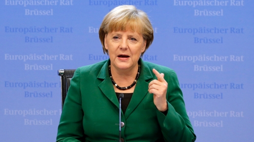 While Spain sinks, Merkel insists on process