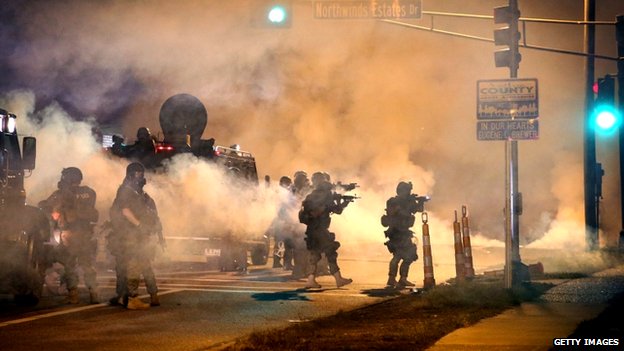 Ferguson unrest: New clashes as Obama urges calm