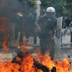 In Athens violent rioters attack demonstrators 