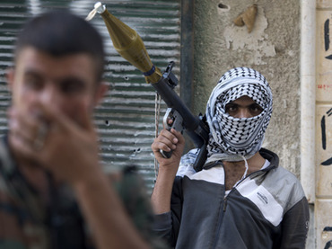 vOpposition calls for “peaceful overthrow” of Assad
