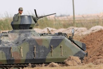 Turkey threatens to use more force against Syria
