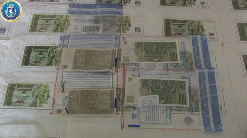  On the fact of manufacturing and selling counterfeit money were arrested the members of the crime group 