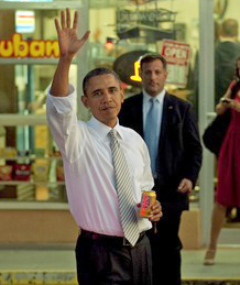 Book thrown at Obama during rally